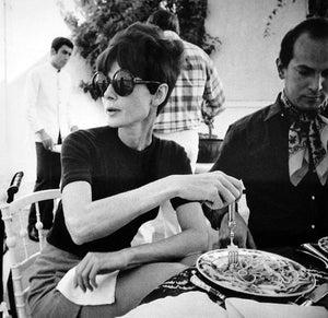 Woman eating pasta